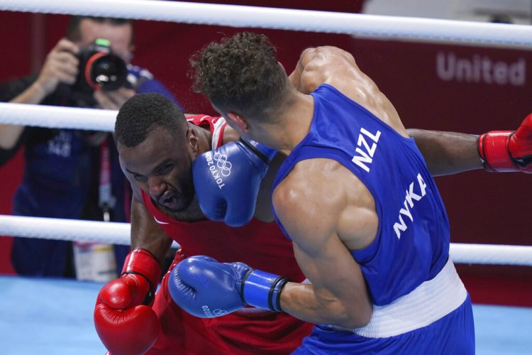 Moroccan Olympic boxer tries to take a bite out of opponent